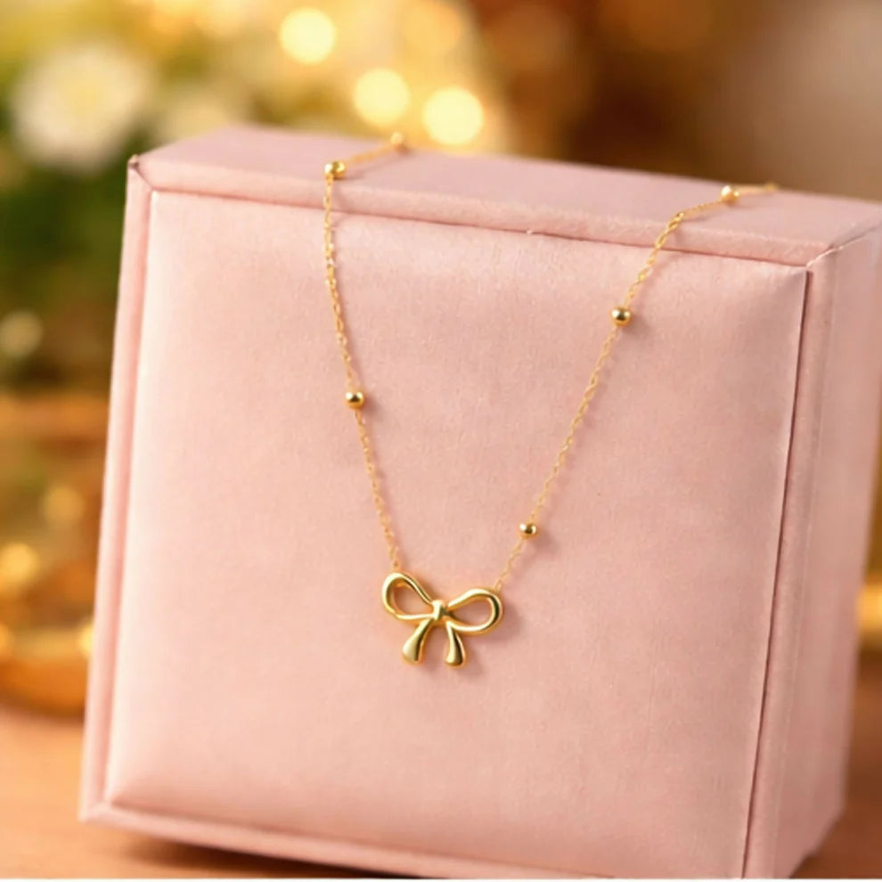 Elegant Gold Bow Necklace – Delicate Ribbon Pendant for Everyday Style