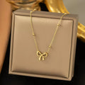 Elegant Gold Bow Necklace – Delicate Ribbon Pendant for Everyday Style