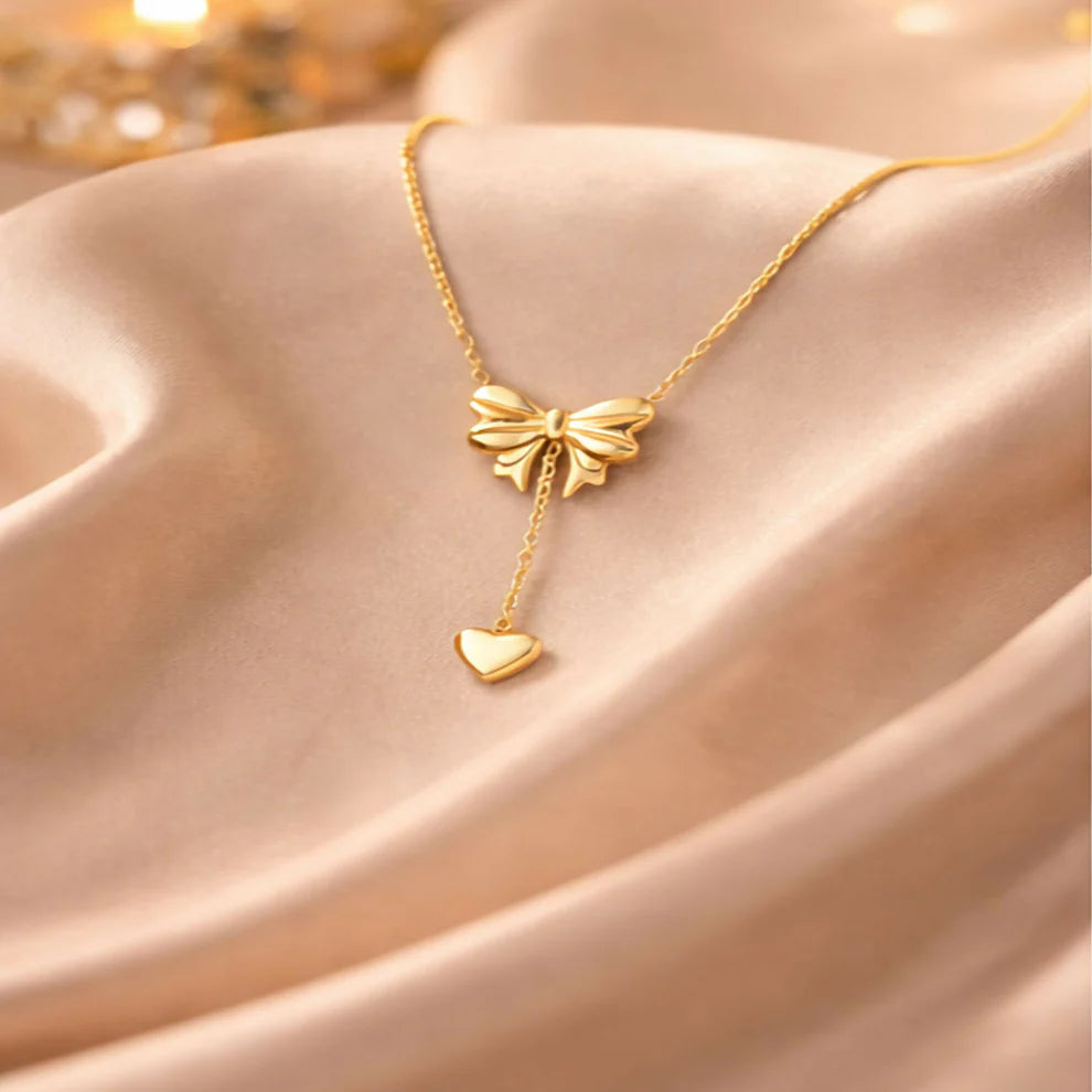 Elegant Gold Bow Lariat Necklace – Delicate Heart Drop Pendant for Timeless Style
