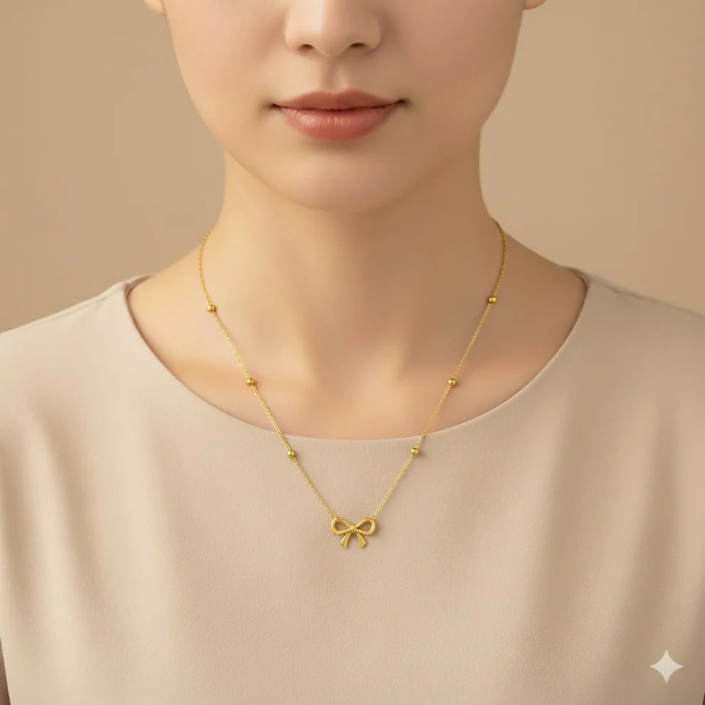 Elegant Gold Bow Necklace – Delicate Ribbon Pendant for Everyday Style