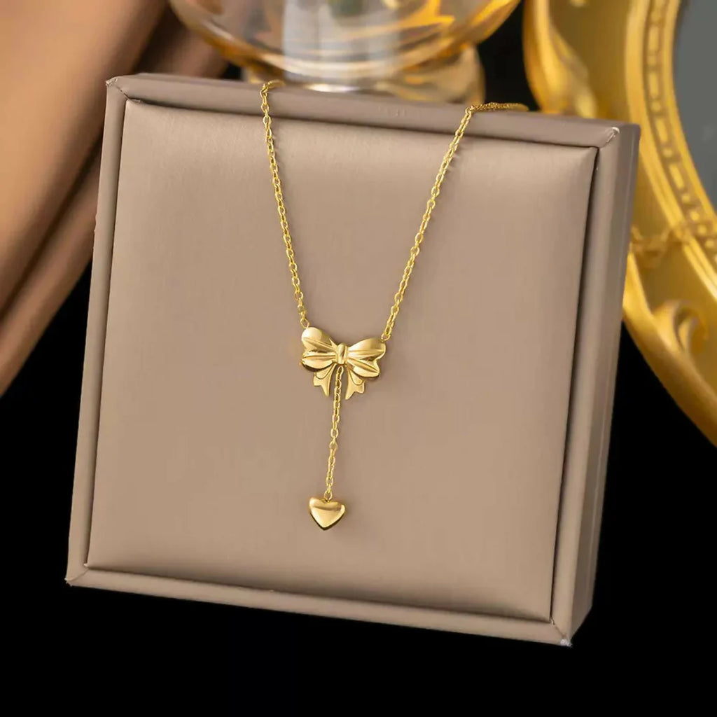 Elegant Gold Bow Lariat Necklace – Delicate Heart Drop Pendant for Timeless Style
