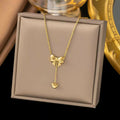 Elegant Gold Bow Lariat Necklace – Delicate Heart Drop Pendant for Timeless Style