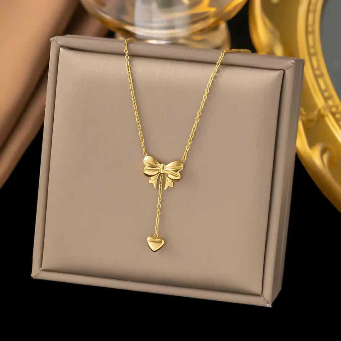 Elegant Gold Bow Lariat Necklace – Delicate Heart Drop Pendant for Timeless Style